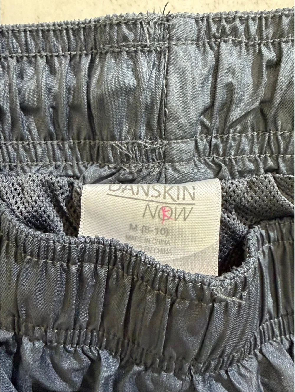 Danskin Now Women's Black Athletic Pants with Orange Side Stripe, Size M (8-10)